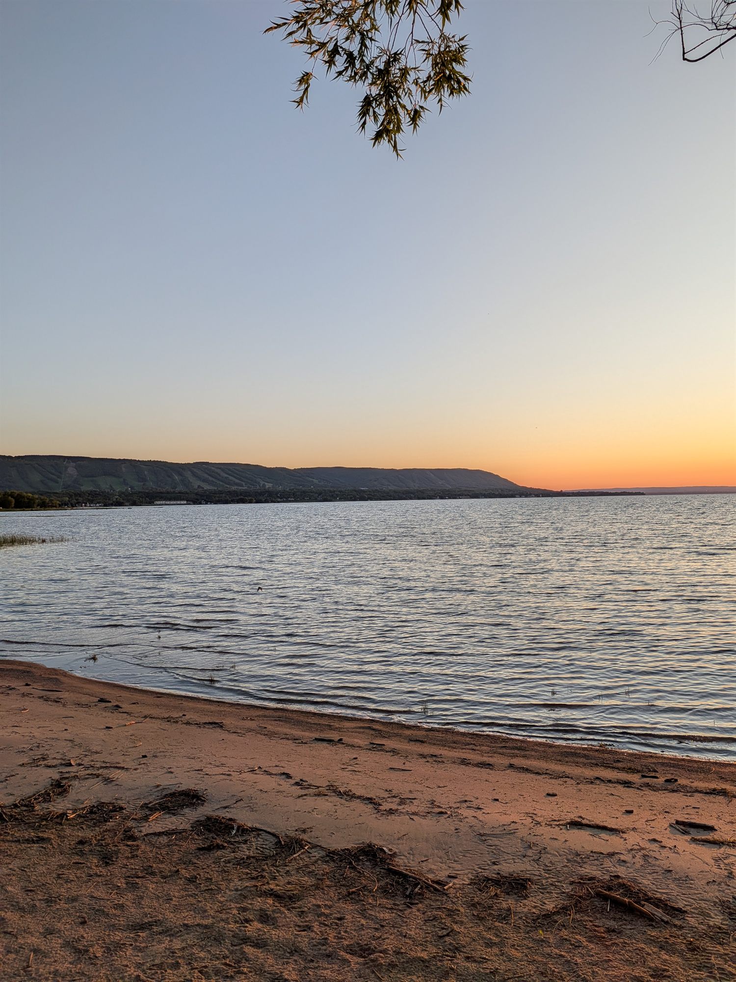 Dusk over Georgian Bay with the Blue Mountain escarpment across the water